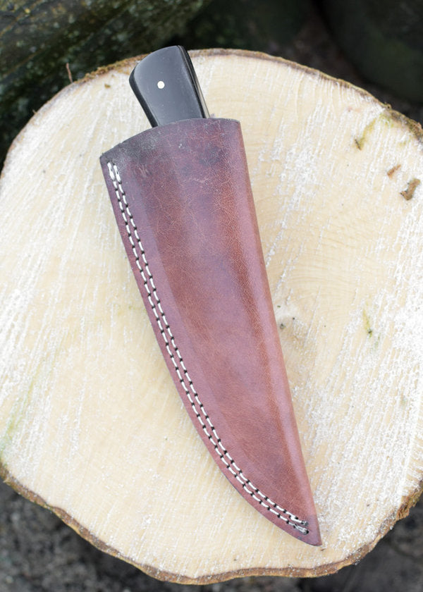 knife with Damascus steel blade and horn handle