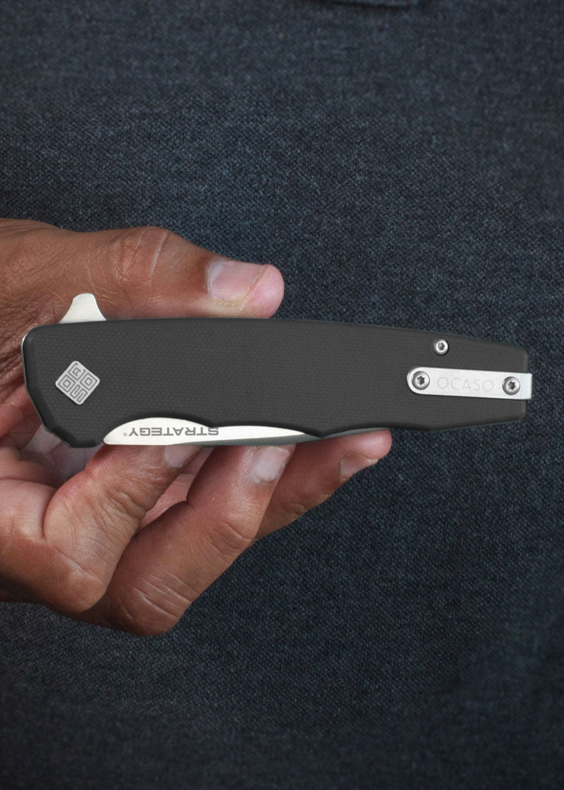Ergonomischer schwarzer G10-Griff des Ocaso Strategy Taschenmessers